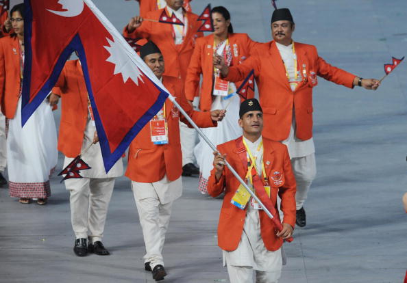 Nepal_carry_flag_at_opening_ceremony_Beijing_2008