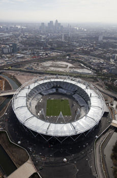Olympic_Stadium_from_air_with_view_of_London_April_1_2011
