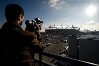 Olympic_Stadium_wtih_cameraman_January_19_2011