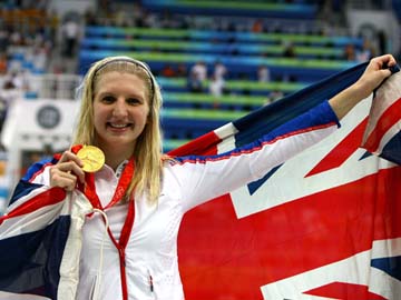 Rebecca Adlington with medal and flag_9