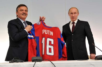 Rene_Fasel_awards_jersey_to_Vladimir_Putin_Bratislava_May_13_2011