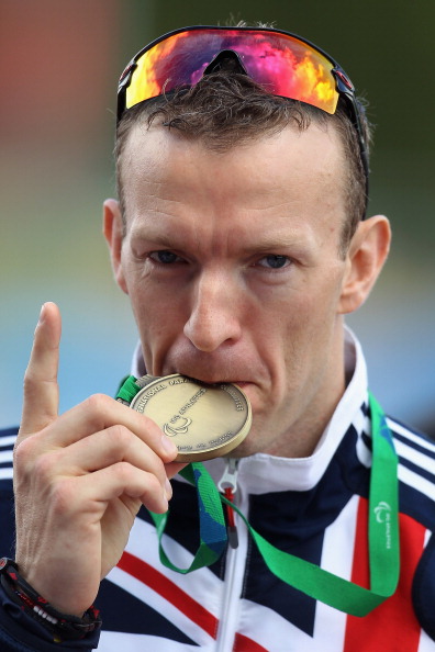 Richard_Whitehead_with_gold_medal_at_World_Championships_January_24_2011
