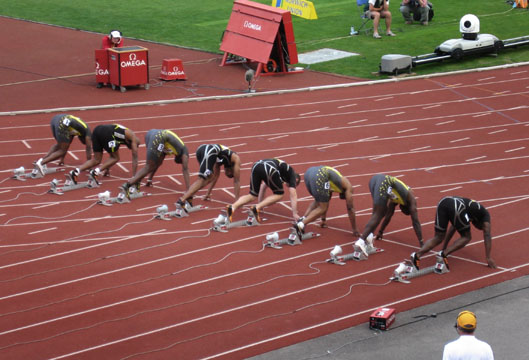 Runners_at_start_of_100m_race