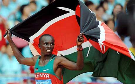 Sammy_Wanjiru_with_Kenyan_flag