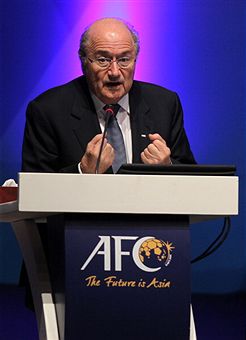 Sepp_Blatter_at_lectern_Doha_January_2011