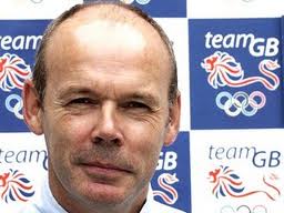Sir_Clive_Woodward_in_front_of_Team_GB_logo