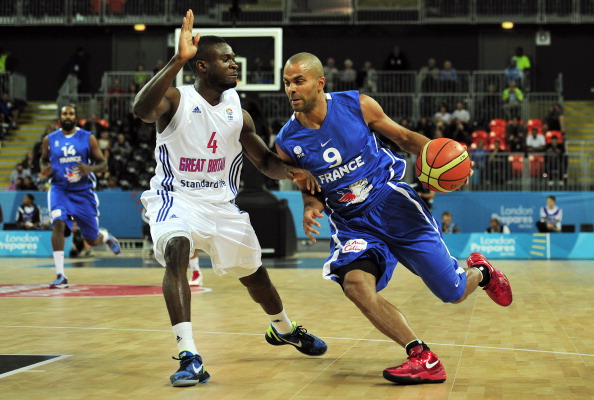 Tony_Parker_of_France_R_vies_with_Ogo_Adegboye_of_Great_Britain_L_during_the_London_International_Basketball_Invitational_02-08-11