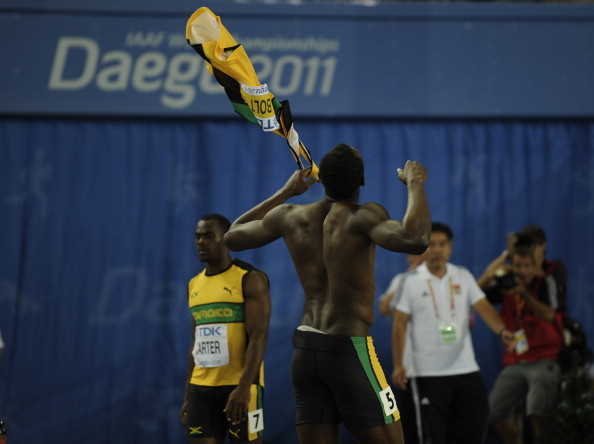 Usain_Bolt_reacts_after_being_disqualified_Daegu_World_Championships_August_28_2011