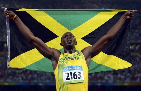 Usain_Bolt_with_Jamaican_flag