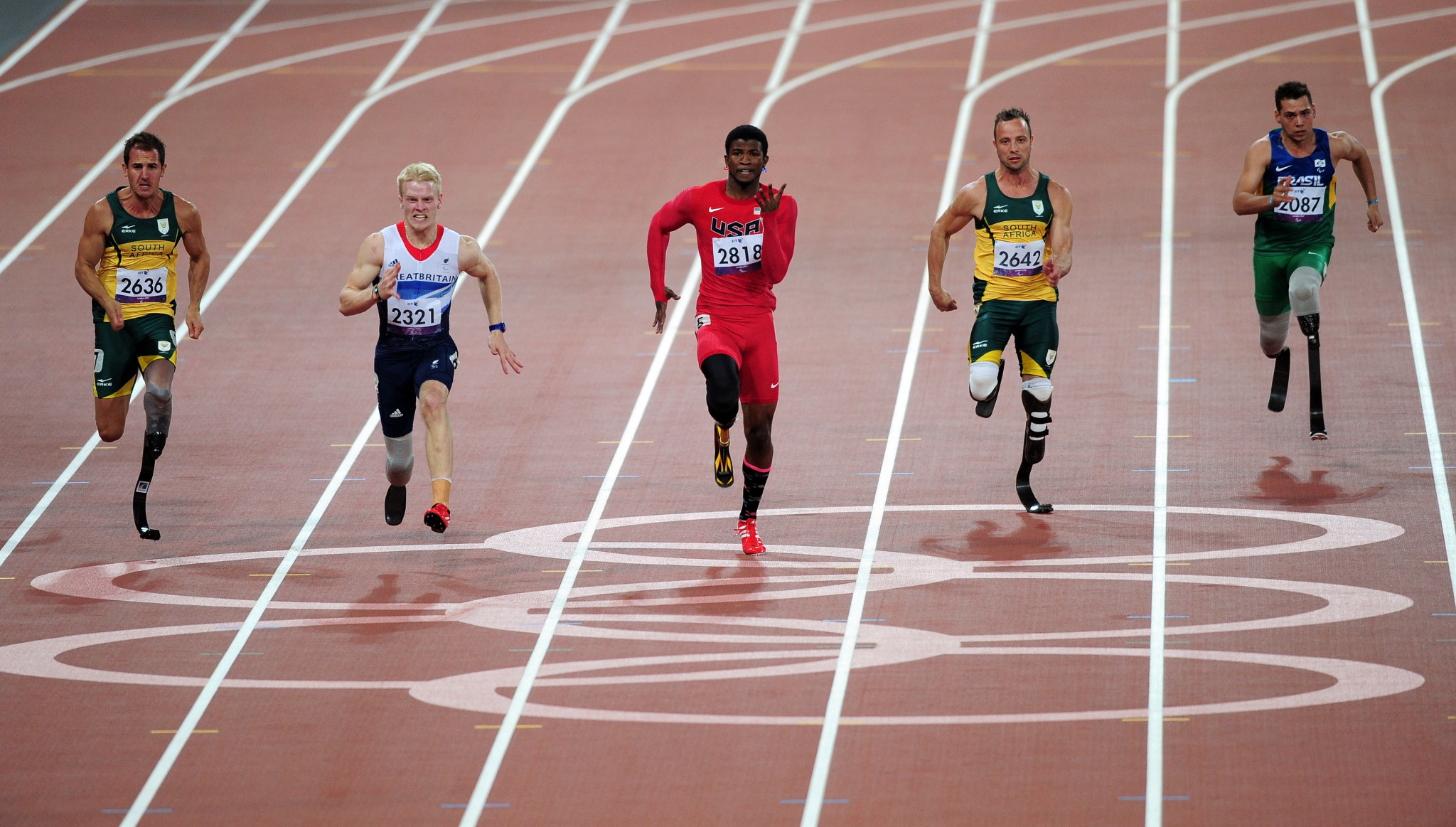 (L-R) Arnu Fourie of South Africa, Jonnie Peacock of Great Britain, Richard Browne of the United States, Oscar Pistorius of South Africa and Alan Oliveira Cardoso Oliveira of Brazil compete in the Men's 100m - T44 Final on day 8 of the London 2012 Paralympic Games ©Getty Images
