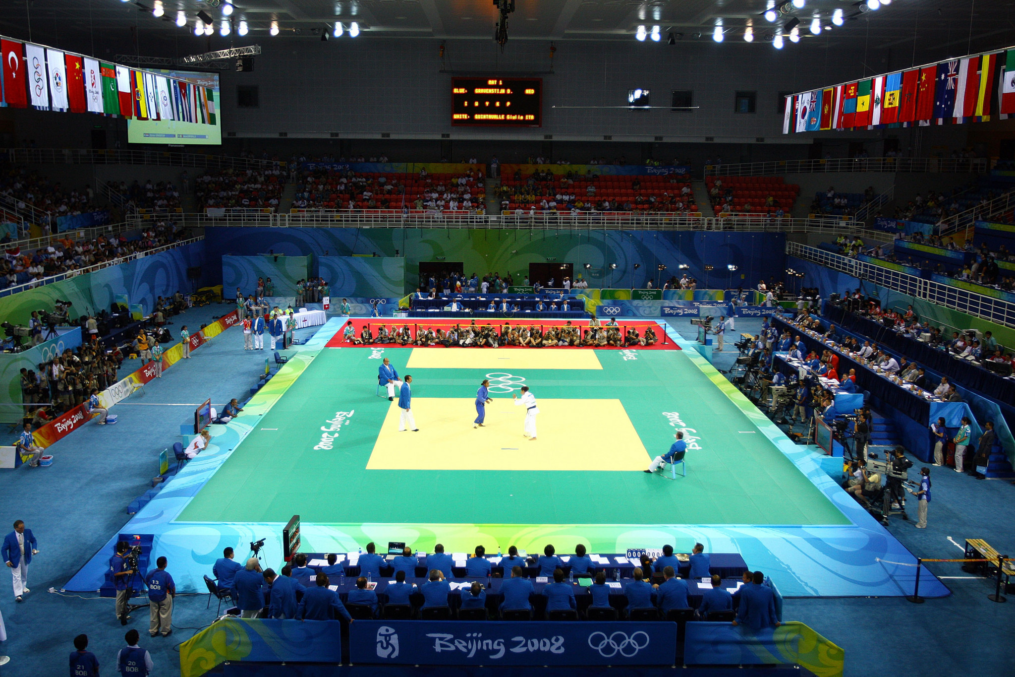 Maria Pekli (white) of Australia fights against Ketleyn Quadros of Brazil during the Women's 57 kg Judo event at the University of Science and Technology Beijing Gymnasium on Day 3 of the Beijing 2008 Olympic Games ©Getty Images