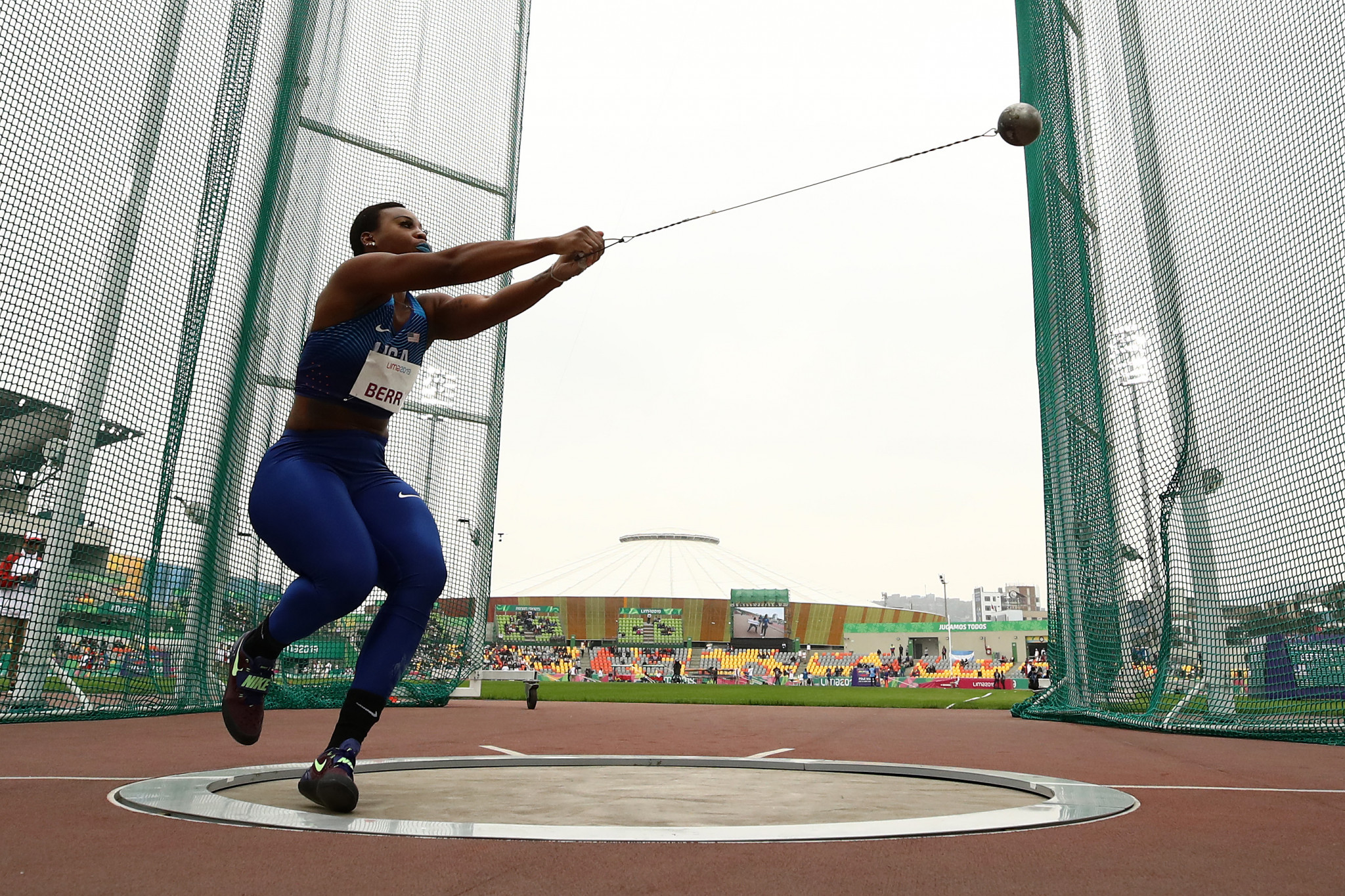 Hammer thrower Gwendolyn Berry staged a separate protest after receiving her gold medal ©Getty Images 